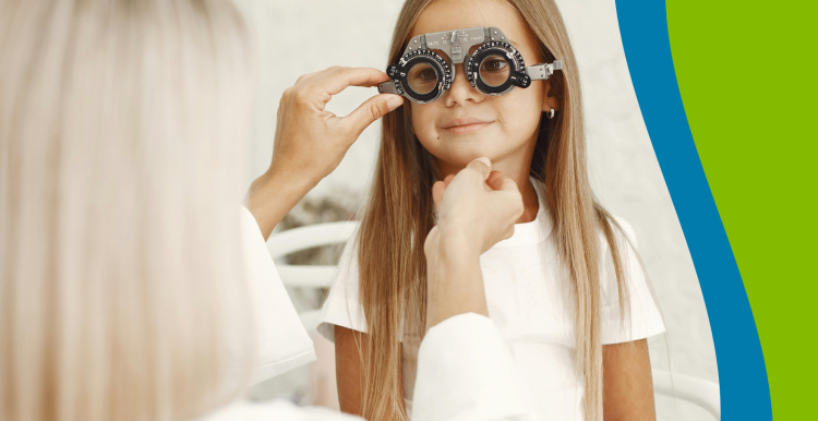 Young girl having eye test