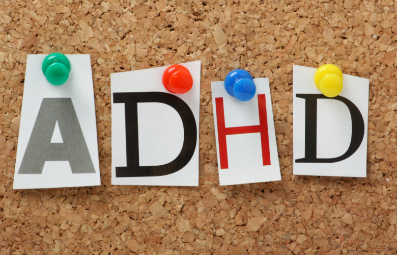 Letters A, D, H, D pinned to a notice board